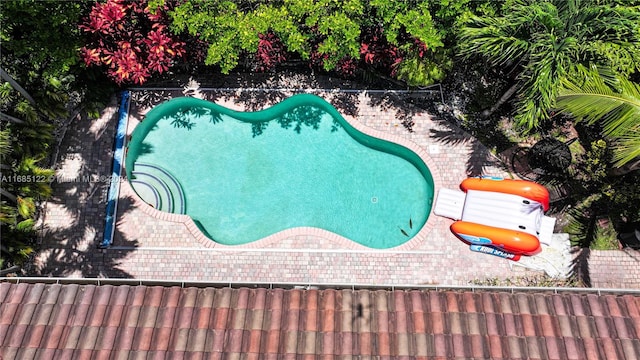 view of pool featuring a patio area