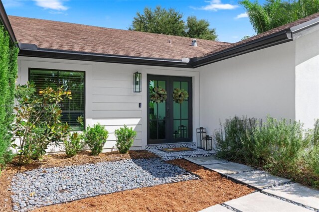 ranch-style home featuring a garage and a front yard