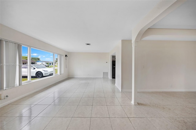 view of tiled spare room