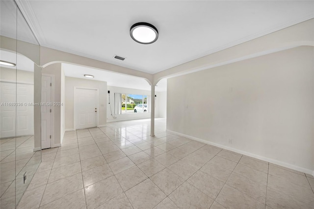 unfurnished room with light tile patterned floors