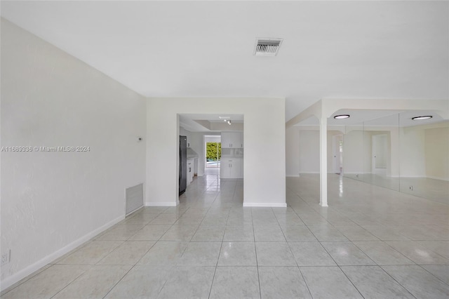 view of tiled empty room