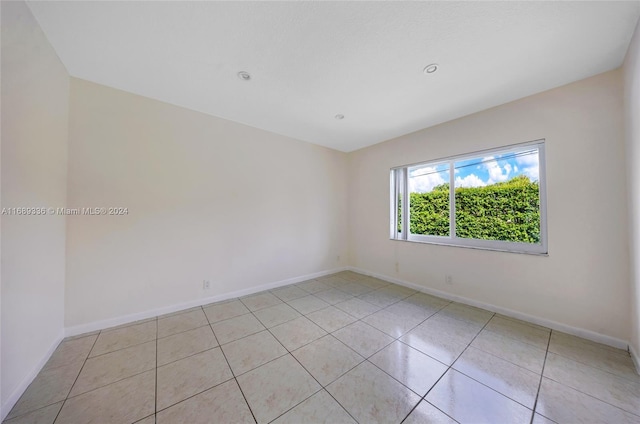 view of tiled spare room