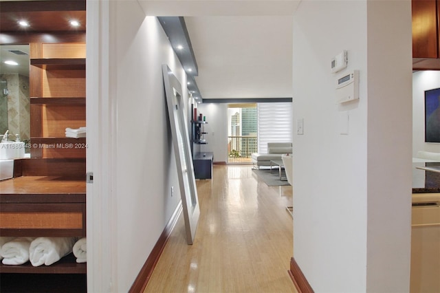 hall featuring light hardwood / wood-style flooring