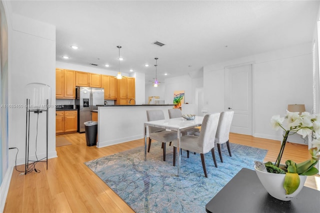 dining room featuring light hardwood / wood-style floors