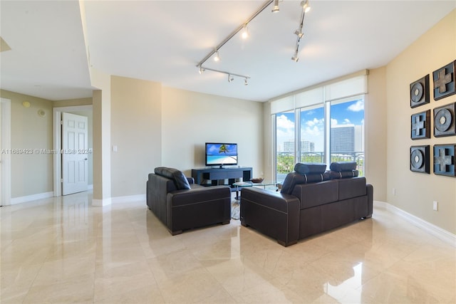 living room featuring rail lighting