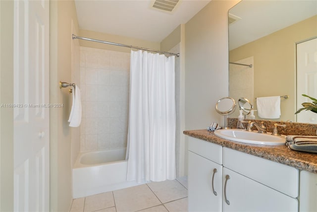 bathroom with vanity, tile patterned floors, and shower / bathtub combination with curtain