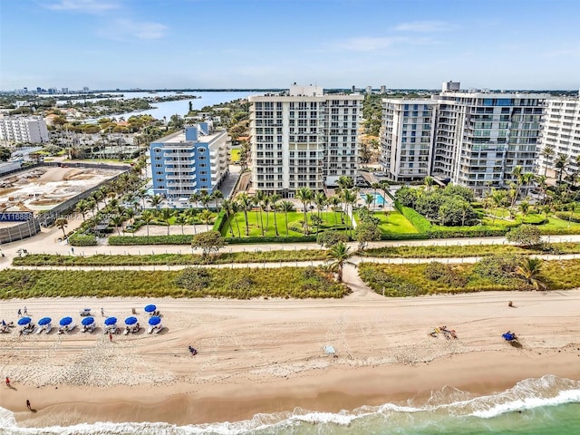 aerial view featuring a water view and a beach view