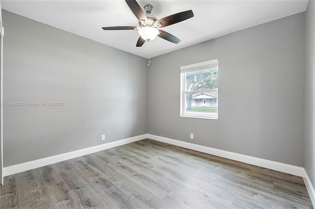 unfurnished room featuring light hardwood / wood-style floors and ceiling fan