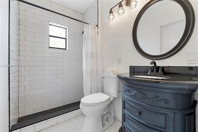 bathroom featuring tile patterned floors, a shower with curtain, toilet, and vanity