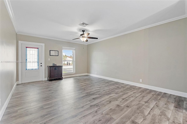 interior space with light hardwood / wood-style flooring, ceiling fan, and ornamental molding