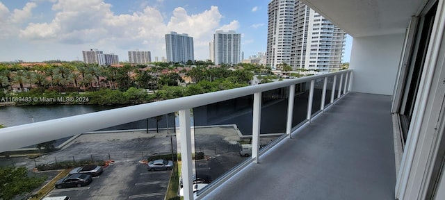 balcony featuring a water view