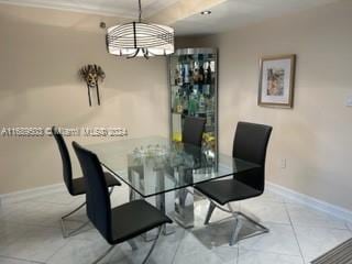 dining area featuring a notable chandelier