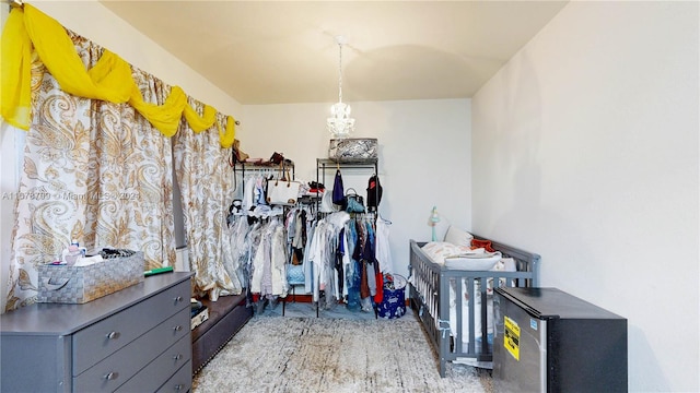 walk in closet with light wood-type flooring