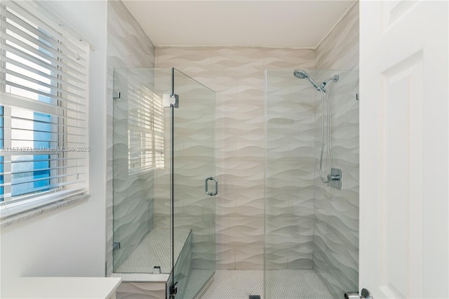 bathroom featuring an enclosed shower