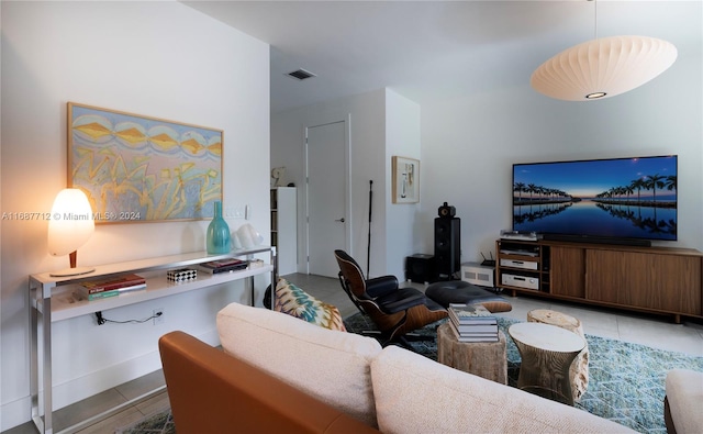 living room featuring tile patterned floors