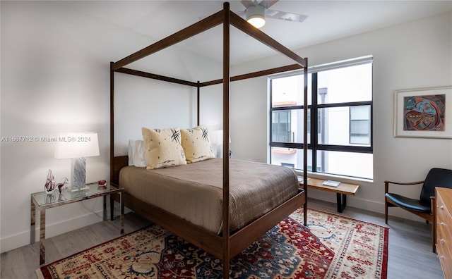 bedroom featuring hardwood / wood-style floors and ceiling fan