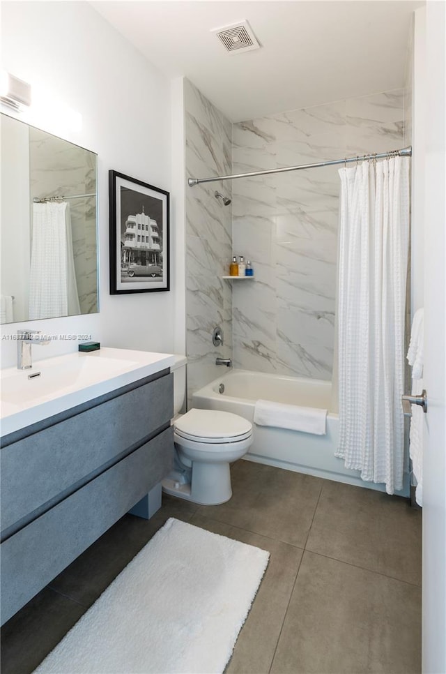 full bathroom with shower / tub combo with curtain, vanity, toilet, and tile patterned flooring