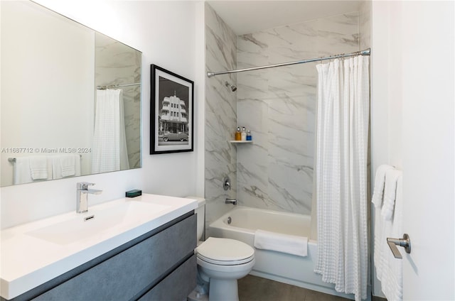 full bathroom with vanity, toilet, and shower / tub combo