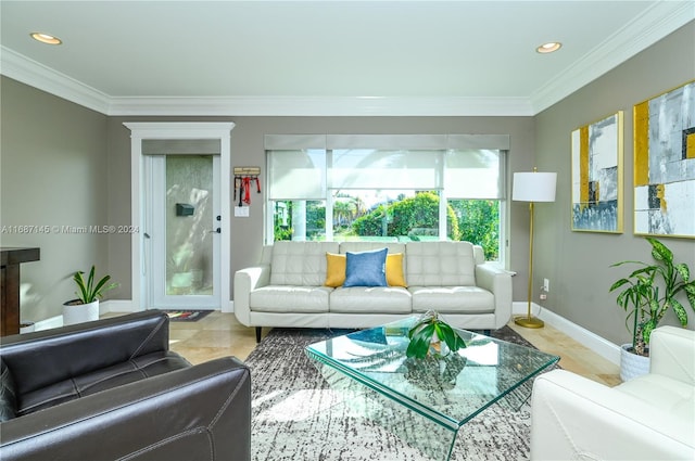 living room featuring tile patterned floors and crown molding