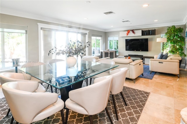 dining area with ornamental molding