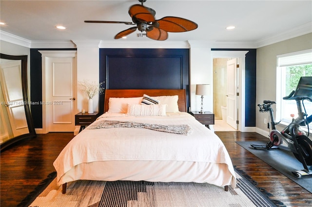 bedroom with ceiling fan, dark hardwood / wood-style flooring, and ornamental molding