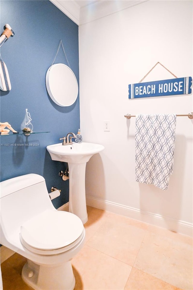 bathroom with tile patterned floors and toilet