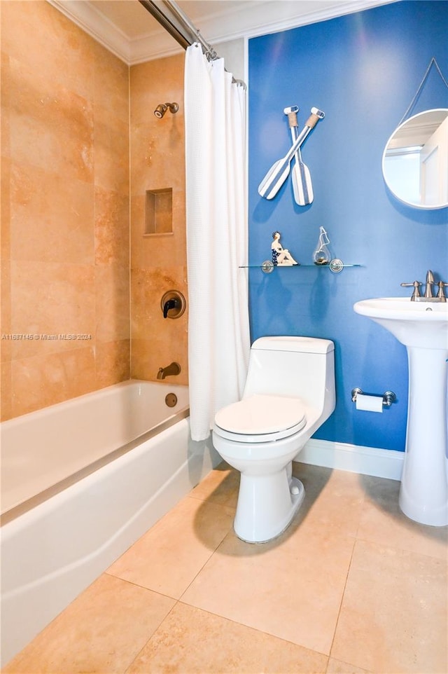 bathroom featuring ornamental molding, tile patterned flooring, toilet, and shower / tub combo with curtain