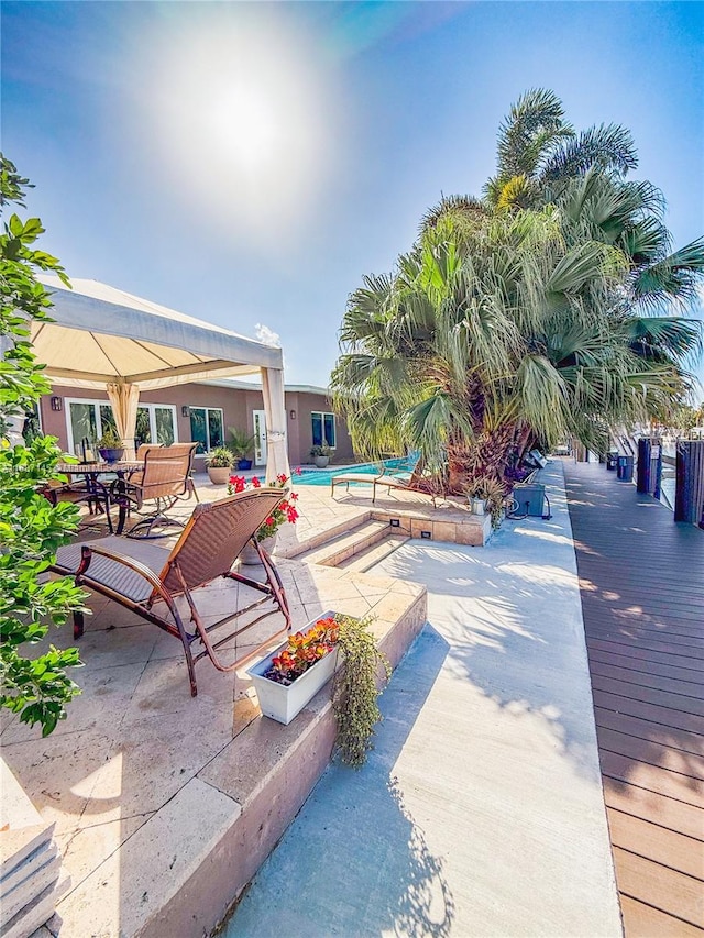 view of swimming pool featuring a patio