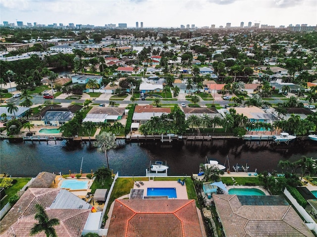 drone / aerial view with a water view