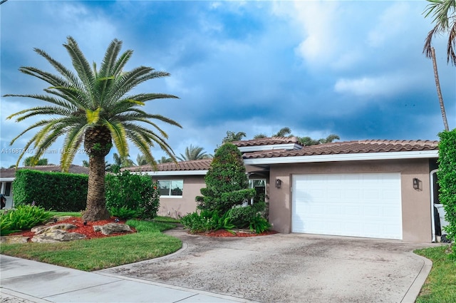 view of front of property featuring a garage