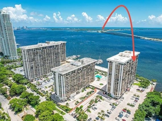 birds eye view of property featuring a water view