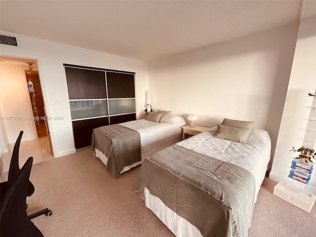 bedroom featuring carpet flooring