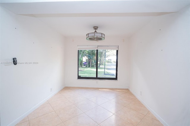 view of tiled spare room