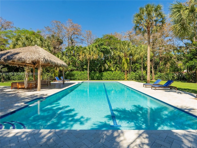 view of pool featuring a patio and a gazebo