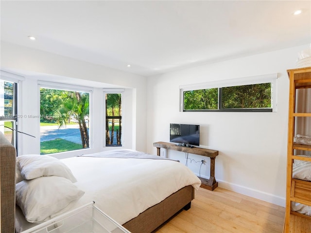 bedroom featuring light hardwood / wood-style floors