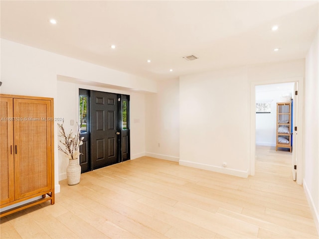 entrance foyer with light hardwood / wood-style floors