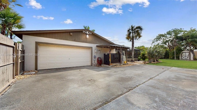 garage with a yard