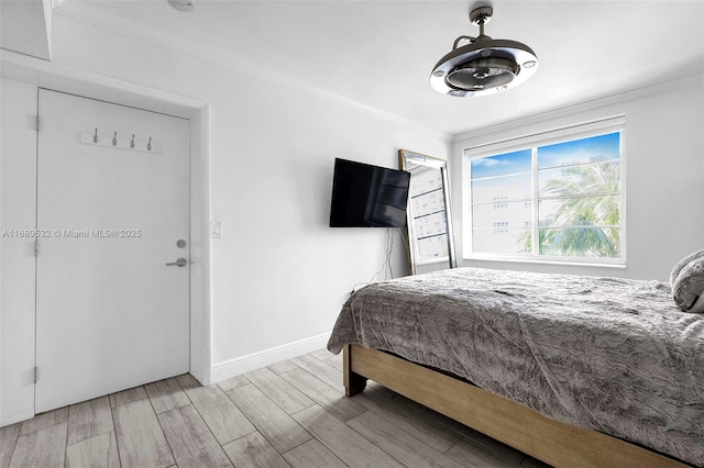 bedroom with crown molding