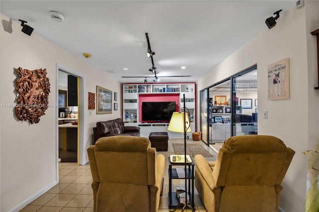 tiled living room with rail lighting