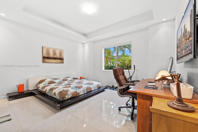 bedroom featuring a tray ceiling