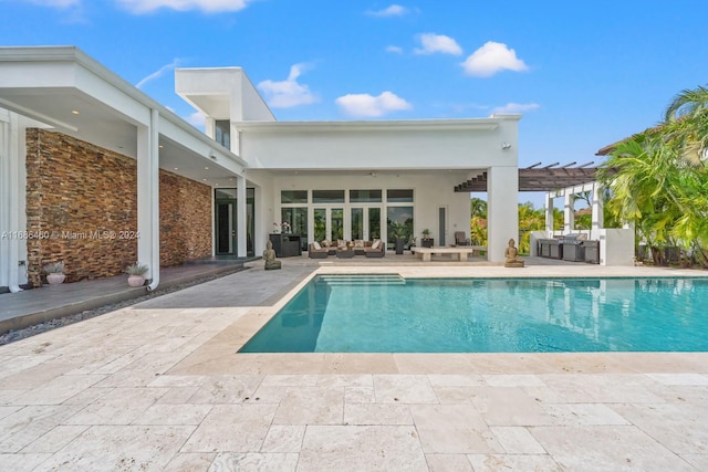 view of swimming pool with a patio and a pergola