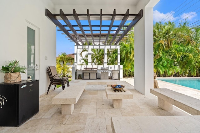 view of patio featuring a pergola and area for grilling