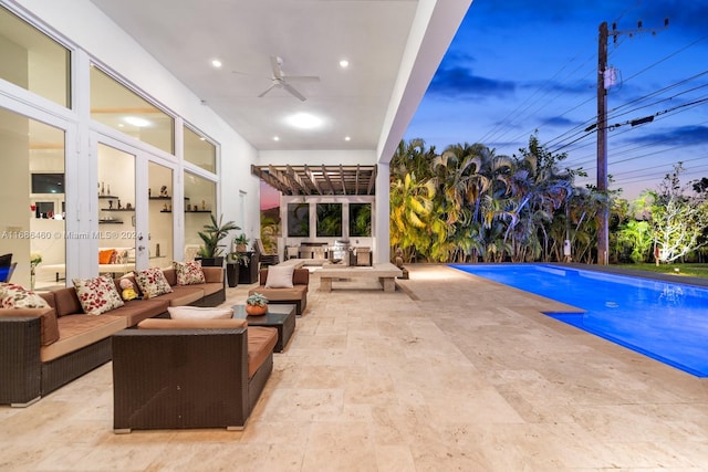 view of pool featuring ceiling fan