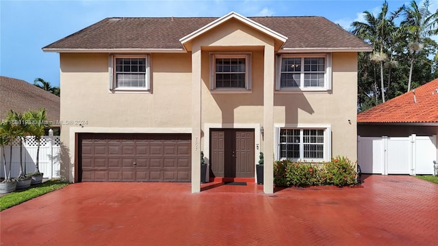 view of front of home with a garage