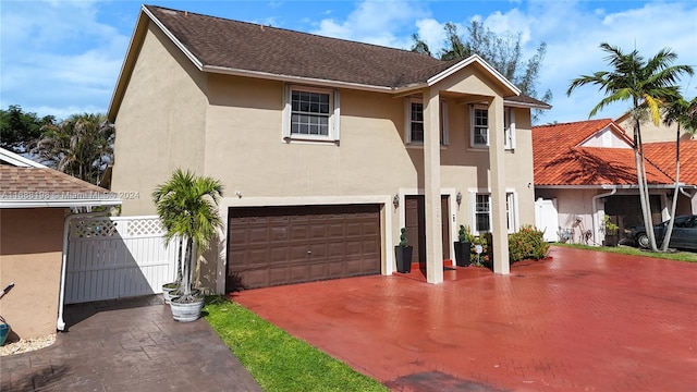 view of front of home with a garage