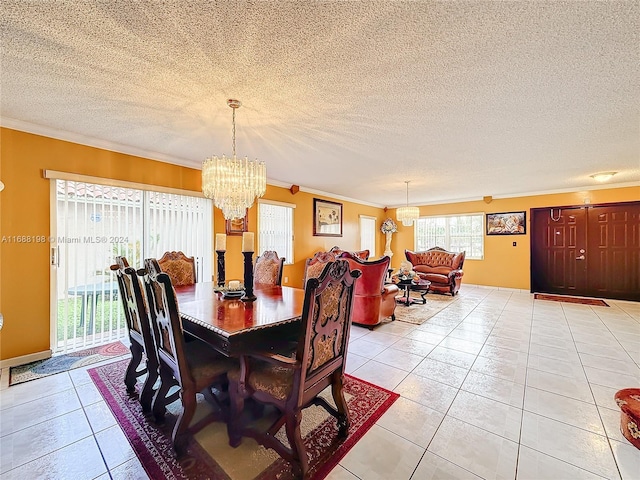 dining room with a notable chandelier, a textured ceiling, light tile patterned floors, and crown molding