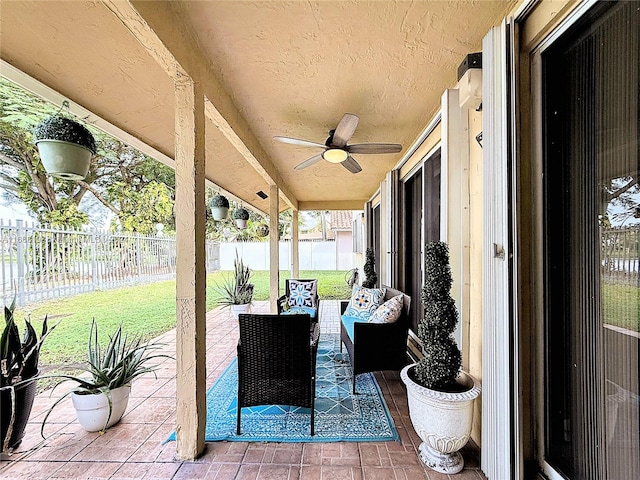 view of patio / terrace with ceiling fan and an outdoor hangout area