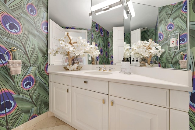 bathroom with tile patterned flooring and vanity