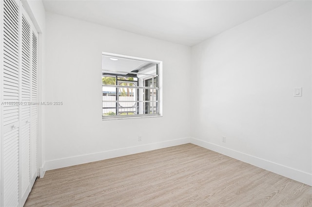 unfurnished room featuring light wood-type flooring