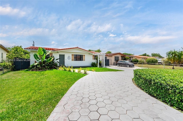 226 SW 104th Ct, Sweetwater, FL 33174 - mediterranean / spanish home featuring decorative driveway, stucco siding, and a tile roof